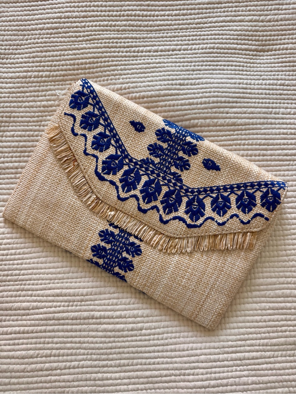 Stella & Dot city slim embroidered indigo Clutch